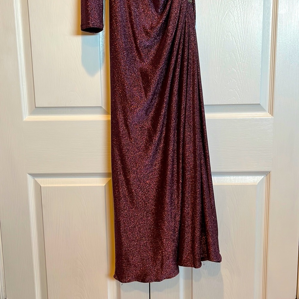 One shoulder evening gown with split. Worn one time